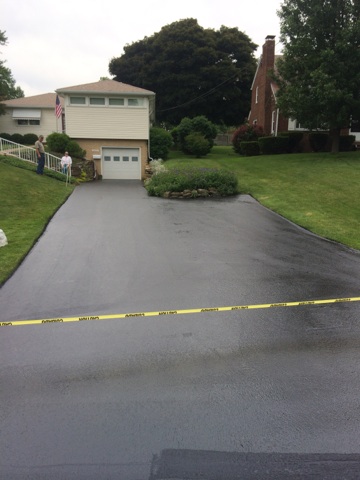 Freshly paved residential driveway with garage in Stark County, Ohio